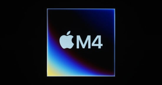 Logo featuring an apple icon with the text "m4" on a gradient blue background, framed within a white square against a dark setting.