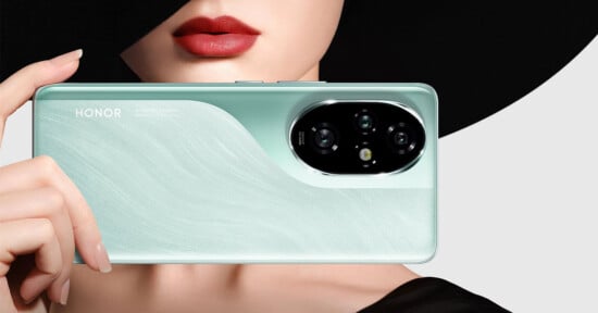 A person with red lipstick and a black hat is holding a mint-green Honor smartphone. The back of the phone features a triple camera setup and the word "HONOR" is visible. The person’s face is partially obscured.