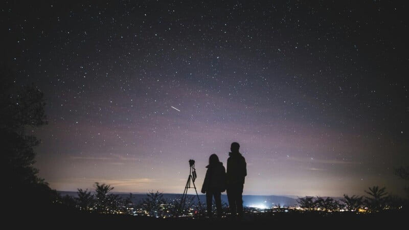 Astrophotographer capturing images of the night sky.