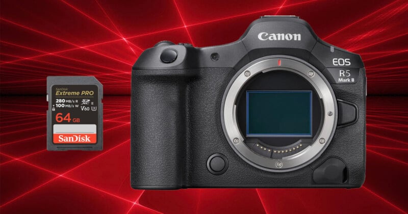 A Canon EOS R5 Mark II camera body without a lens is displayed next to a 64GB SanDisk Extreme PRO memory card. The background features a dynamic red laser light pattern.