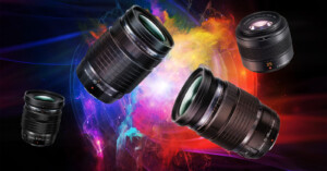 Four camera lenses floating against a vibrant, cosmic background with colorful explosions of blue, red, and green nebula-like effects.